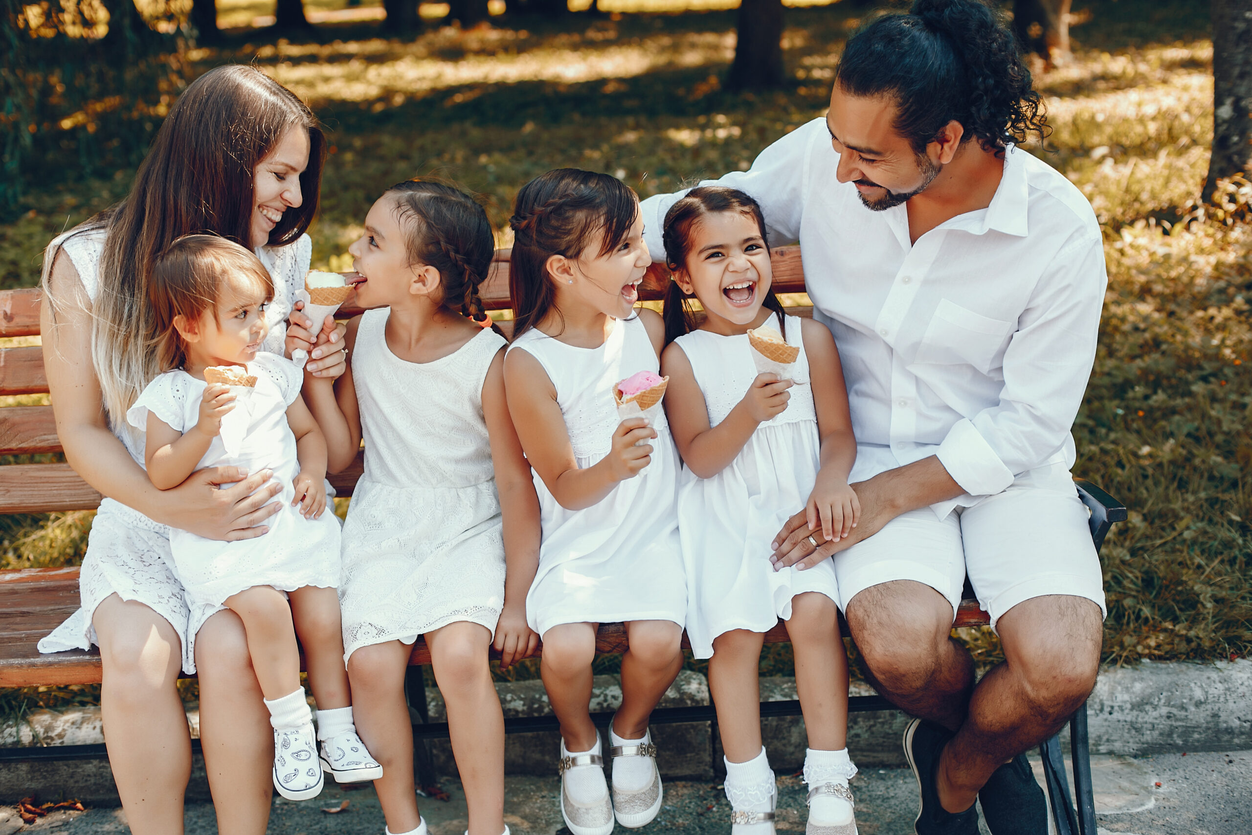 Big family playing in a summer park